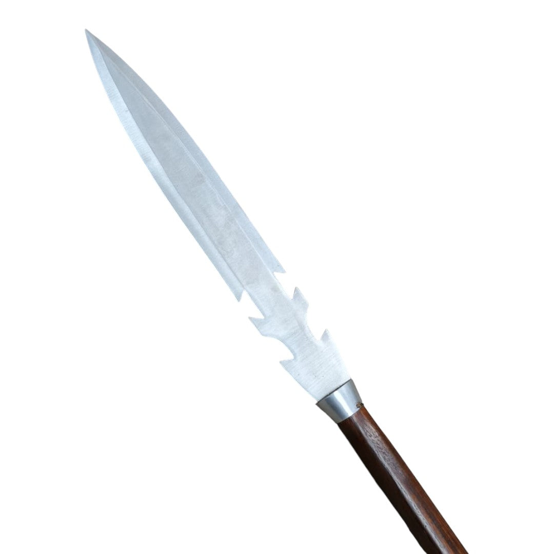 Decorative spear with a metallic blade and wooden handle on a white background