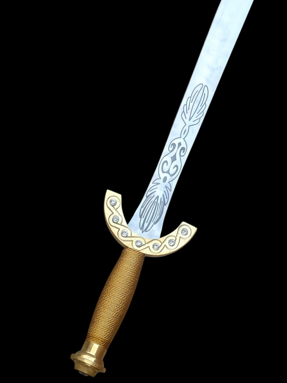 Decorative sword with gold handle and blue blade on a black background