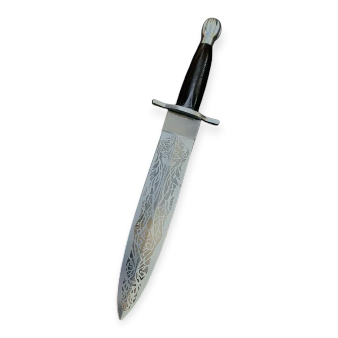 Decorative dagger with a detailed blade on a white background
