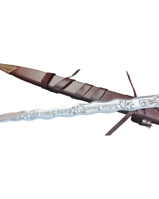 Decorative sword with a detailed blade on a white background