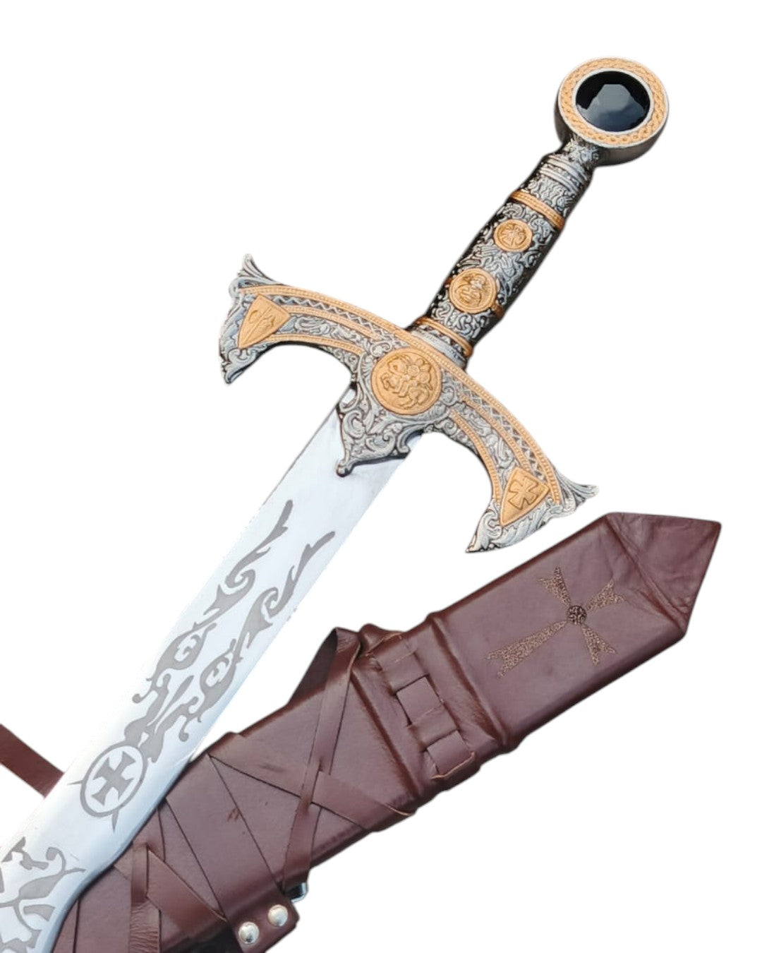 Decorative sword with intricate designs on a white background