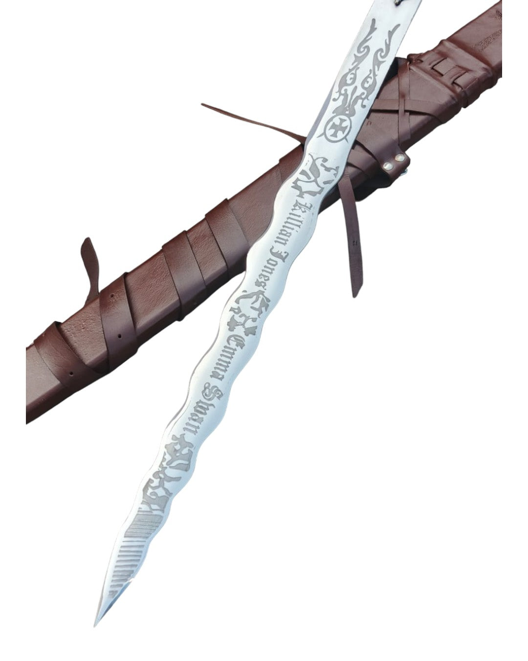 Decorative sword with engraved blade on a white background