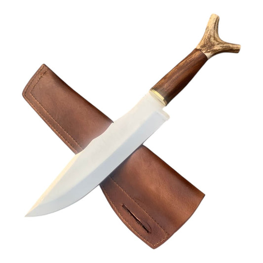 Knife with wooden handle and leather sheath on a white background