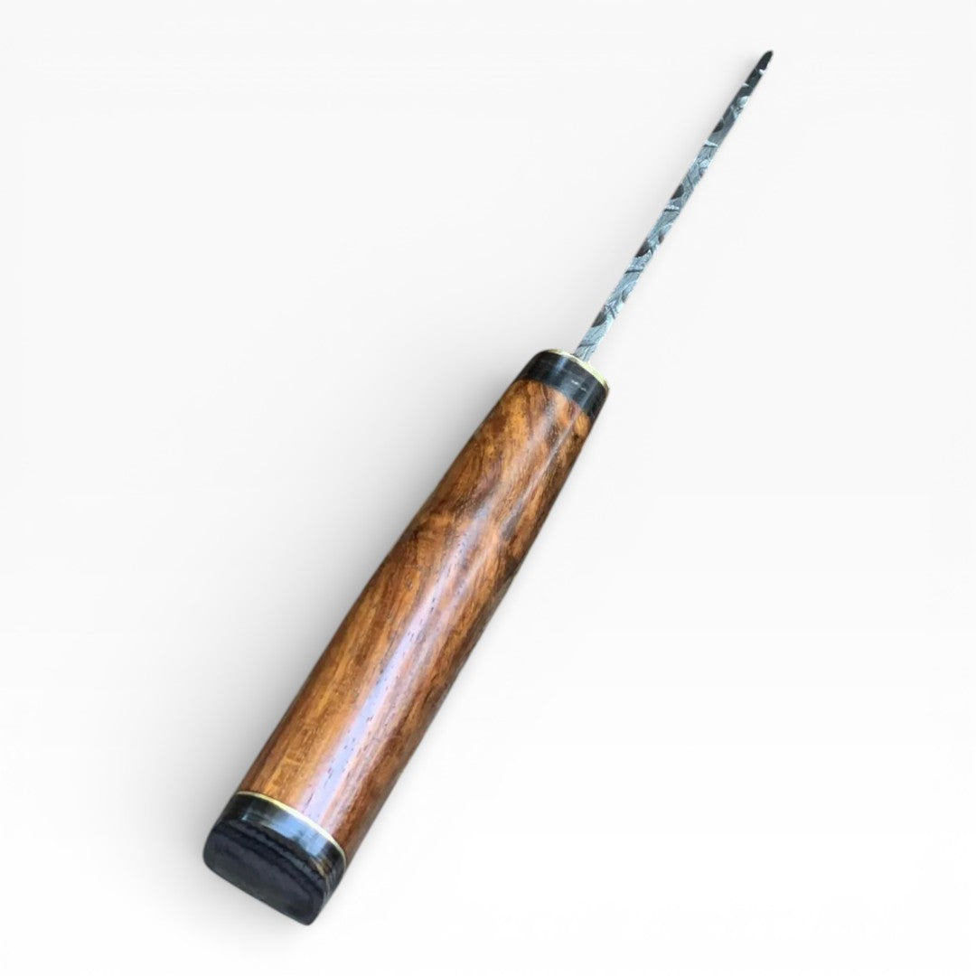 Wooden-handled tool with a metallic tip on a white background