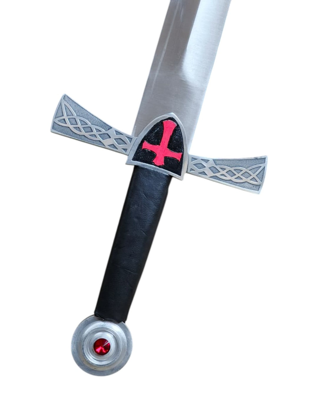Toy sword with a black handle and silver blade featuring red accents on a white background