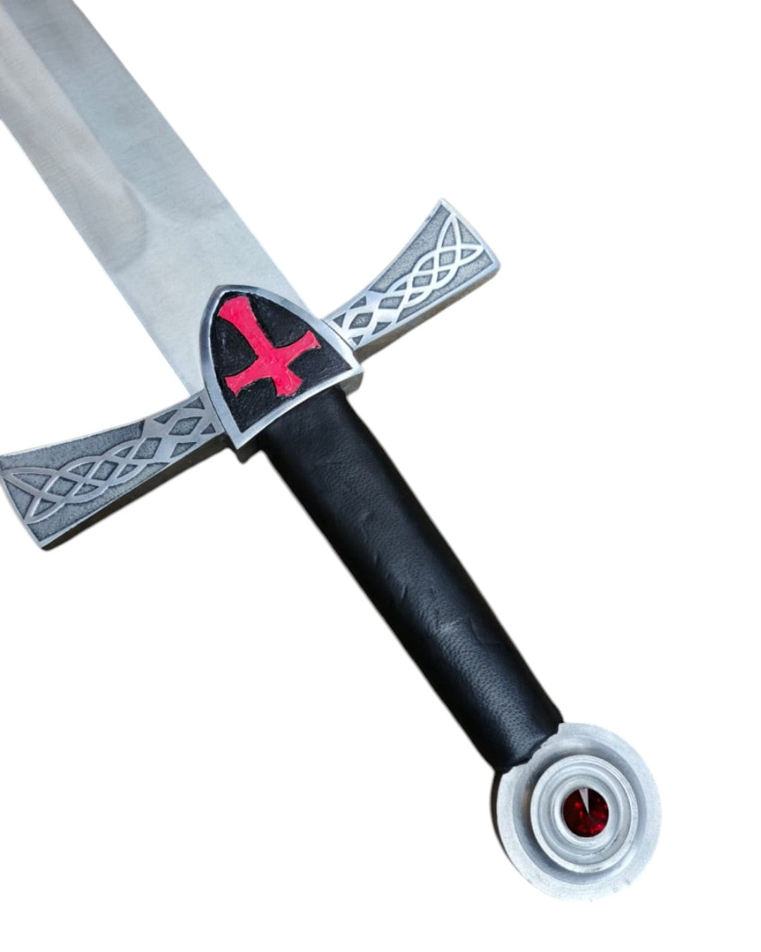 Sword with a decorative hilt featuring a red emblem on a white background